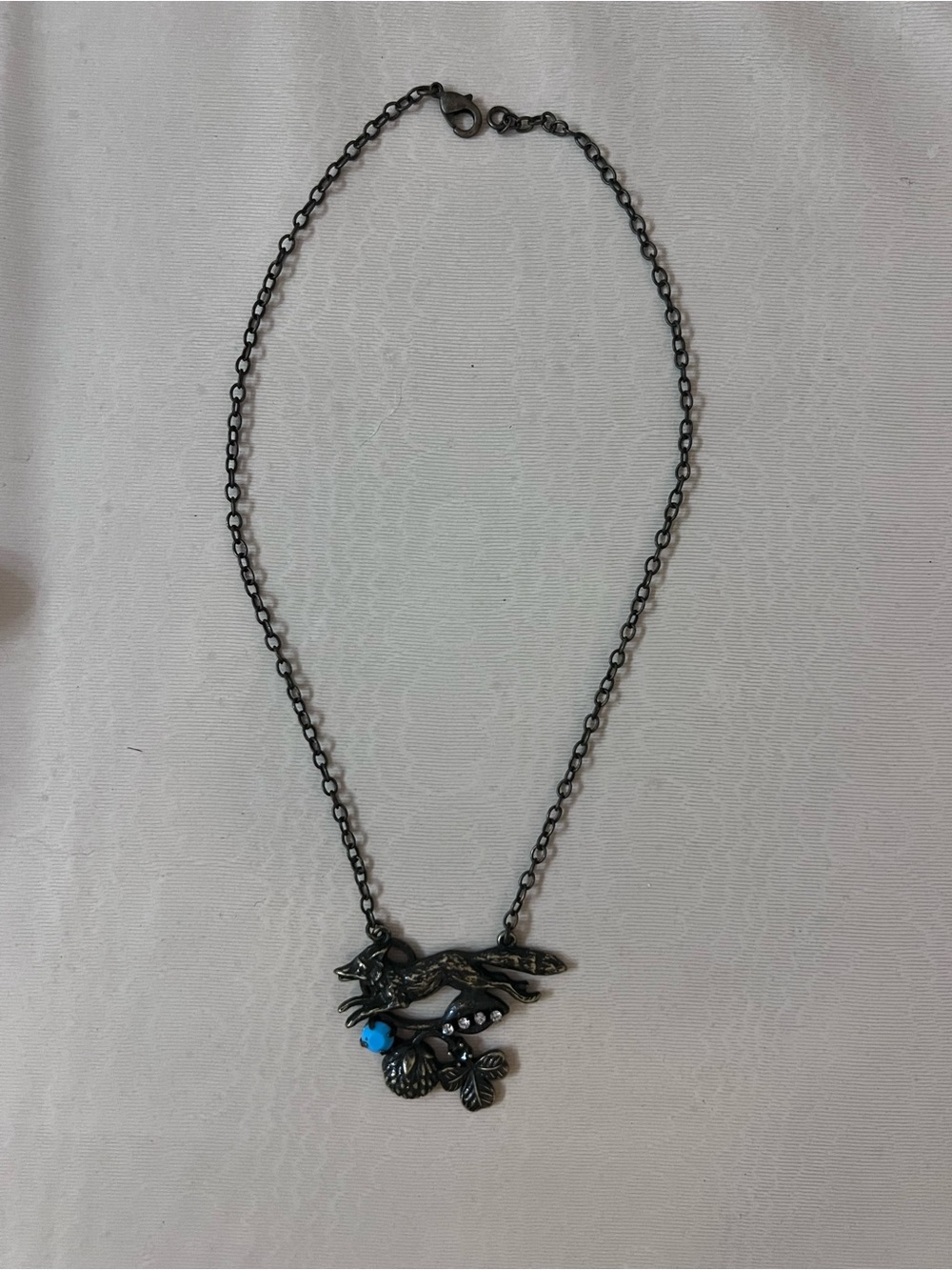 Anthropologie Black Bird Pendant Necklace with Blue Accent
